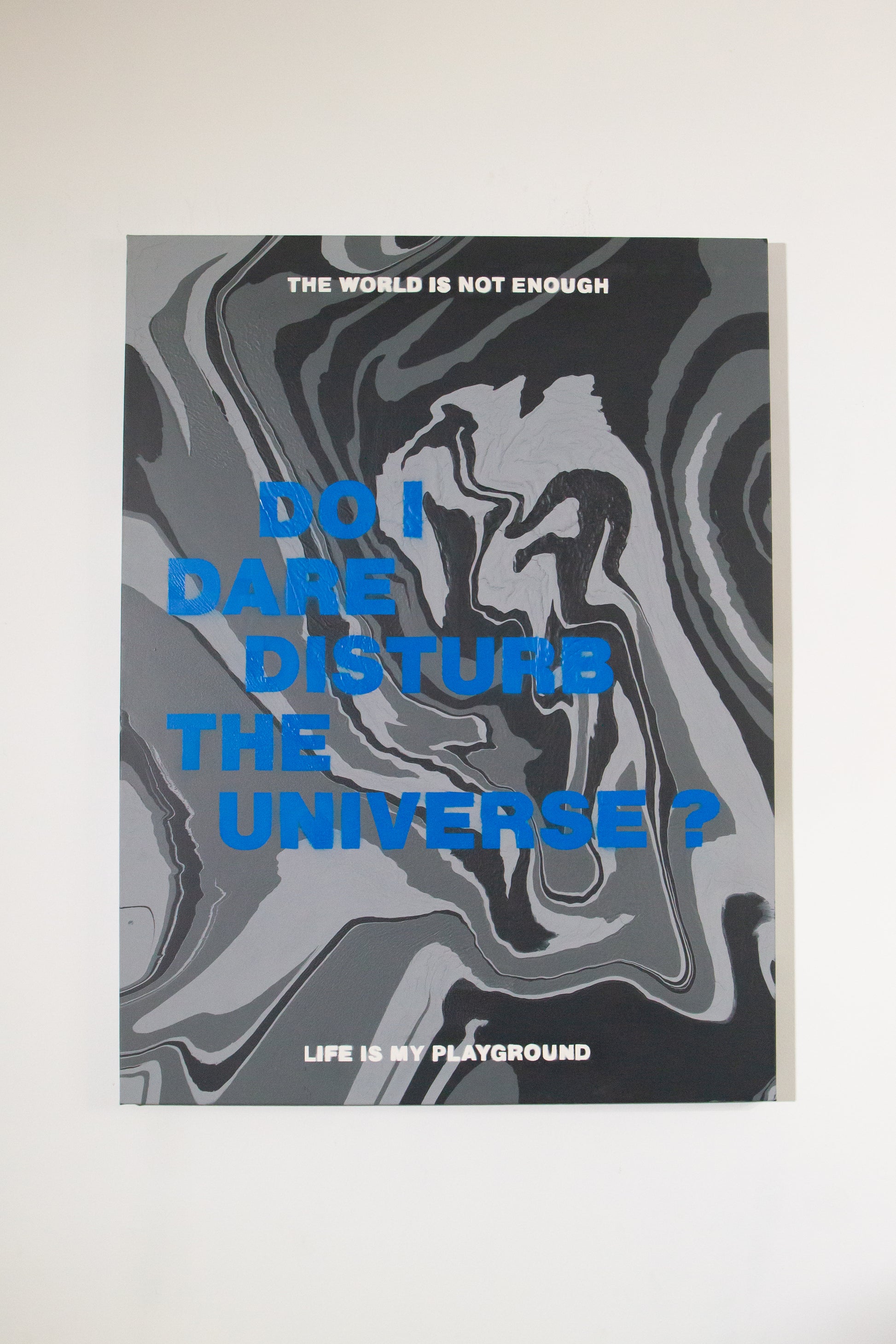 painting with white and blue typography design and on a abstract gray camouflage background